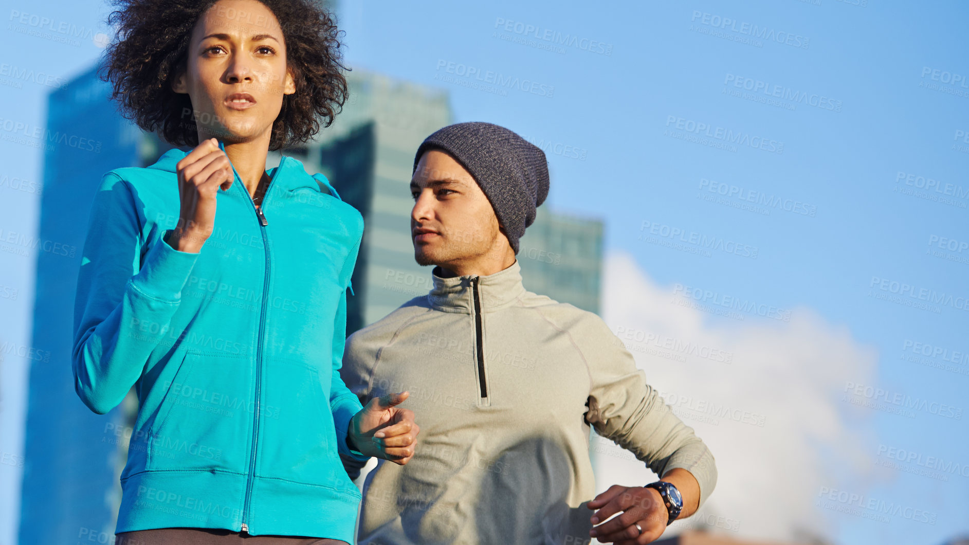 Buy stock photo City, man and woman together for running fitness and training commitment for healthy body. Morning, exercise and athlete couple with urban workout, outdoor challenge or sports performance on blue sky