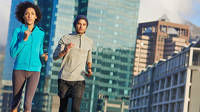 Buy stock photo Running, man and woman together for urban fitness, training and commitment for healthy body. Morning, exercise and athlete couple with city workout, outdoor challenge or sports performance with team