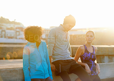 Buy stock photo Friends, thinking and rest in city for fitness, exercise and running session for marathon challenge outdoor. Bridge, man and women by sunshine for wellness goals, jog break and bonding together