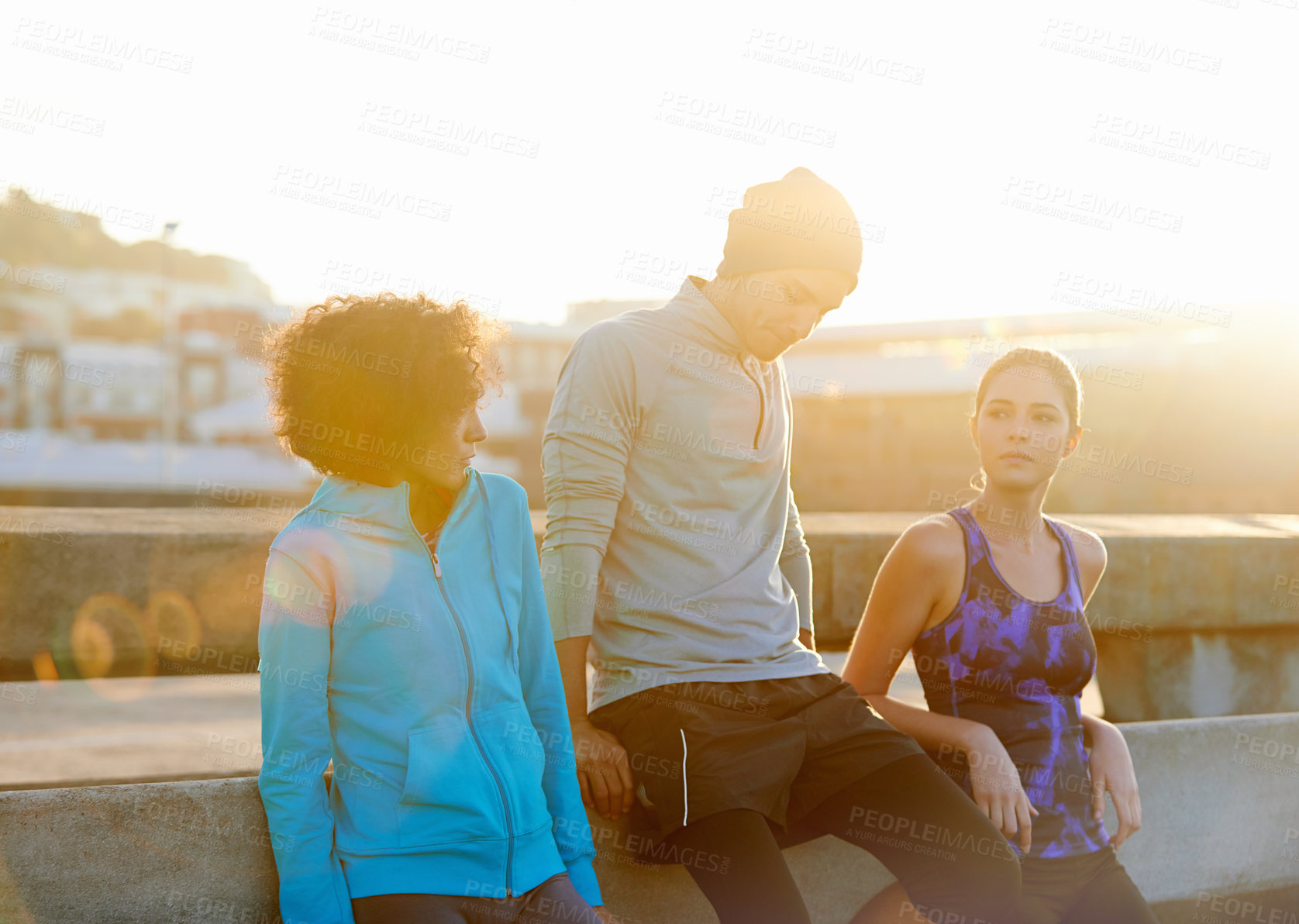 Buy stock photo Friends, thinking and rest in city for fitness, exercise and running session for marathon challenge outdoor. Bridge, man and women by sunshine for wellness goals, jog break and bonding together