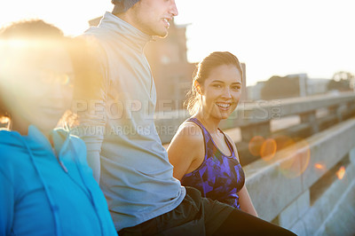 Buy stock photo Friends, portrait and laughing in city for fitness, exercise and running session for marathon challenge outdoor. Bridge, man and women by sunshine for wellness goals, jog break and bonding together