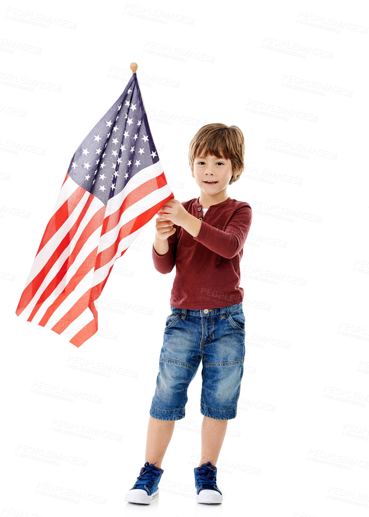 Buy stock photo America, flag and portrait of kid in studio for government, patriotism and pride in country. Little child, happy and relax with fabric by white background for national elections, voting and democracy