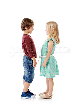 Buy stock photo Children, fashion and profile with young couple for crush, relationship or youth in studio on a white background. Kindergarden, kids or boy and girl with smile for innocent love or childhood together