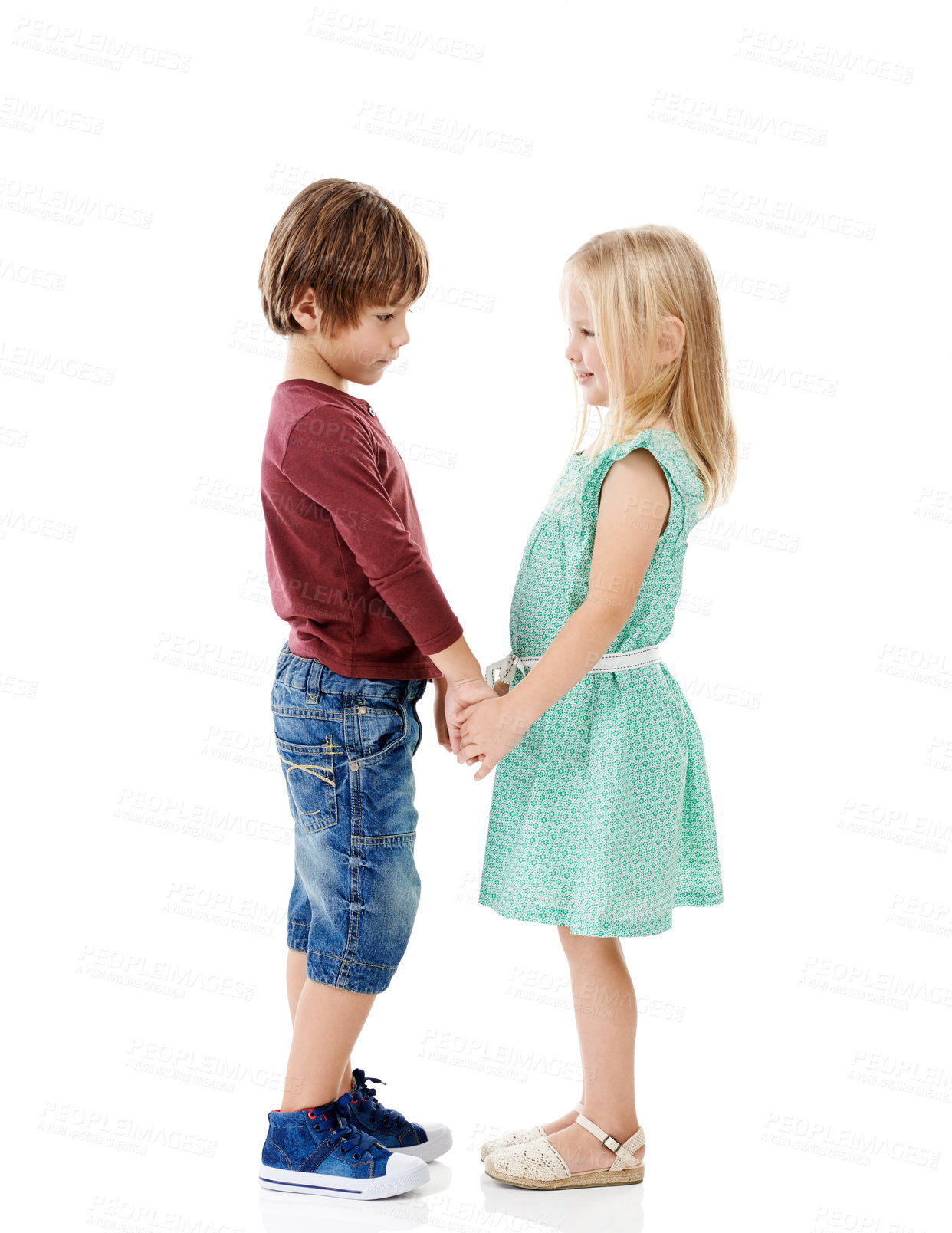 Buy stock photo Holding hands, happy and children in studio for love, care and bonding on a white background. Cute, adorable and isolated young boy and girl connection for sibling relation, care and family support