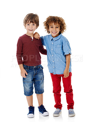Buy stock photo Studio shot of two cute little boys posing together against a white background