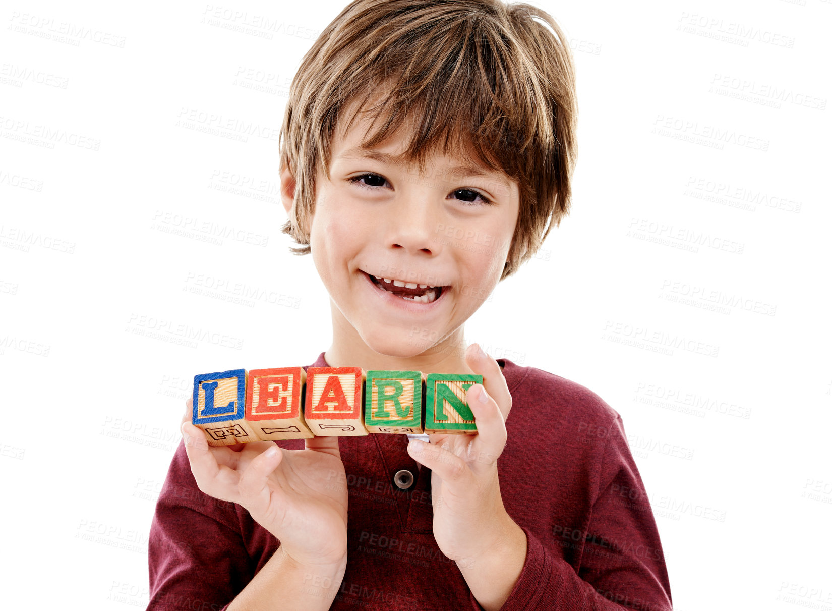 Buy stock photo Happy, studio and portrait of child with building blocks for learning, education and development. Creative, childhood and isolated young boy with school toys for spelling games on white background