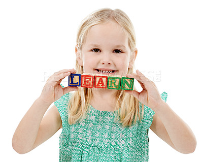 Buy stock photo Happy, studio and portrait of girl with building blocks for learning, education or child development. Creative, childhood and isolated young kid with toys for spelling games on white background