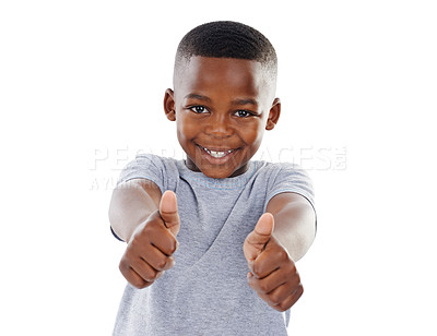 Buy stock photo Studio shot of a cute little boy  giving you thumbs up against a white background