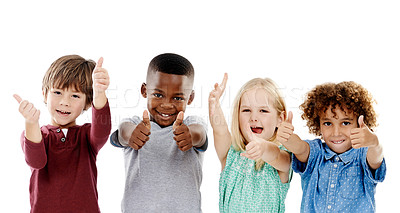 Buy stock photo Children, group and thumbs up for diversity in studio portrait with smile, agreement and white background. Girl, boy or isolated friends for happiness, hand like or solidarity for kids with kindness