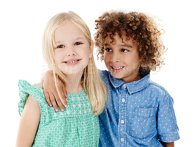 Buy stock photo Studio shot of a cute little boy and girl posing together against a white background