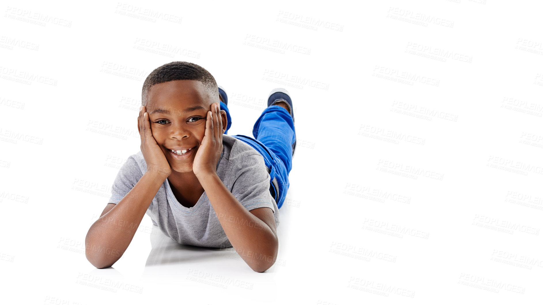 Buy stock photo Floor, happy and portrait of child in studio for relaxing, resting and chill on a white background. Smile, youth and isolated African boy laying with mockup space for development, growth or childhood