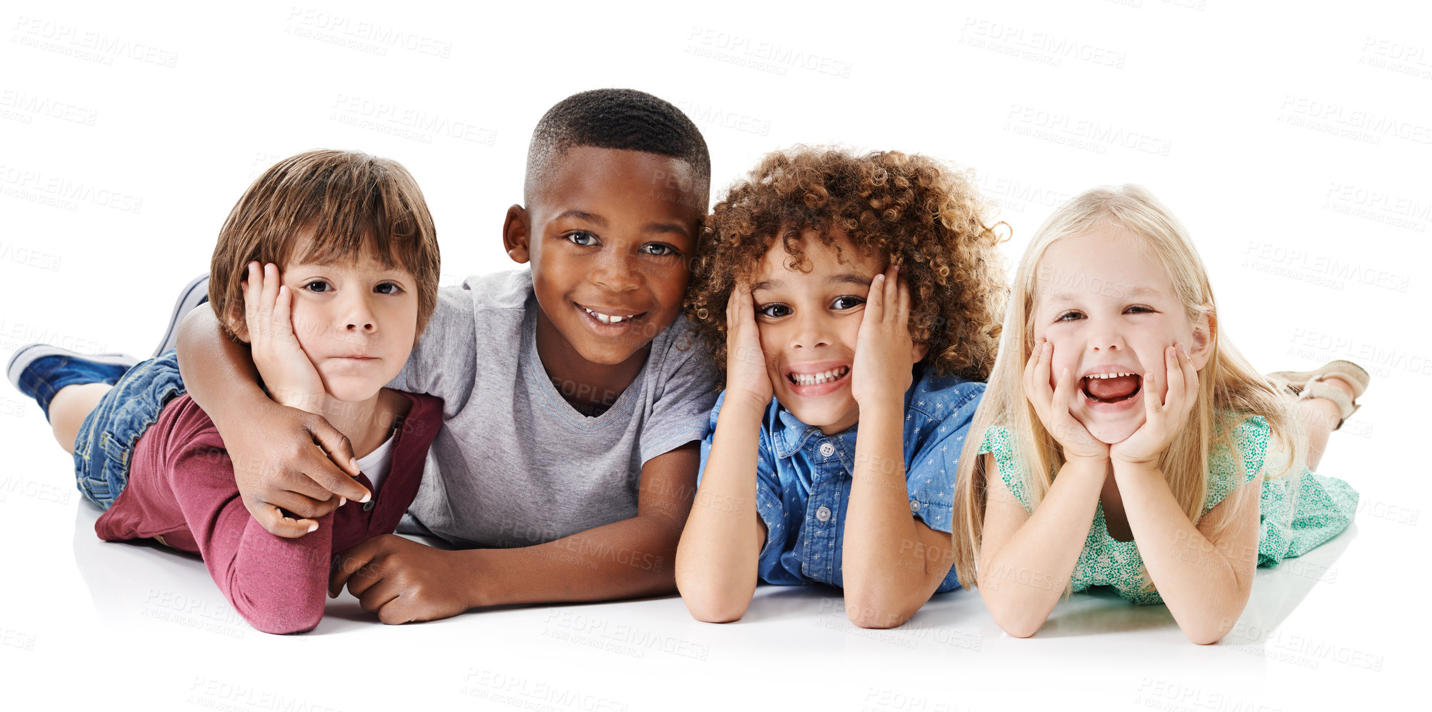 Buy stock photo Studio shot of a group of young friends lying on the floor together against a white background