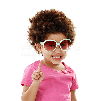 Buy stock photo Studio shot of a cute little girl in casual wear and sunglasses posing against a white background