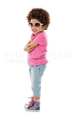 Buy stock photo Studio shot of a cute little girl in casual wear and sunglasses posing against a white background