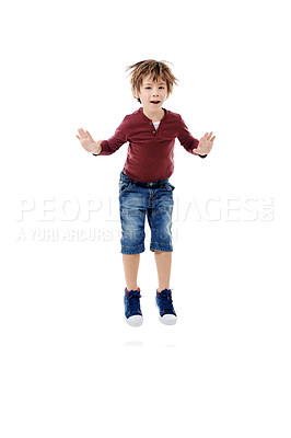 Buy stock photo Studio, excited and boy in portrait for jump, celebration or cheerful for first day of kindergarten. Mockup space, happy kid and child development with game for playful, energetic or white background