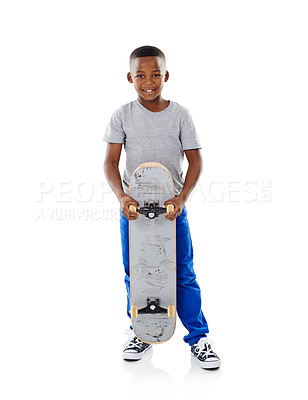 Buy stock photo Studio, portrait and black child with skateboard for playing, training and practice for game. Mockup space, happy kid and young boy with sports equipment for riding, coordination and white background