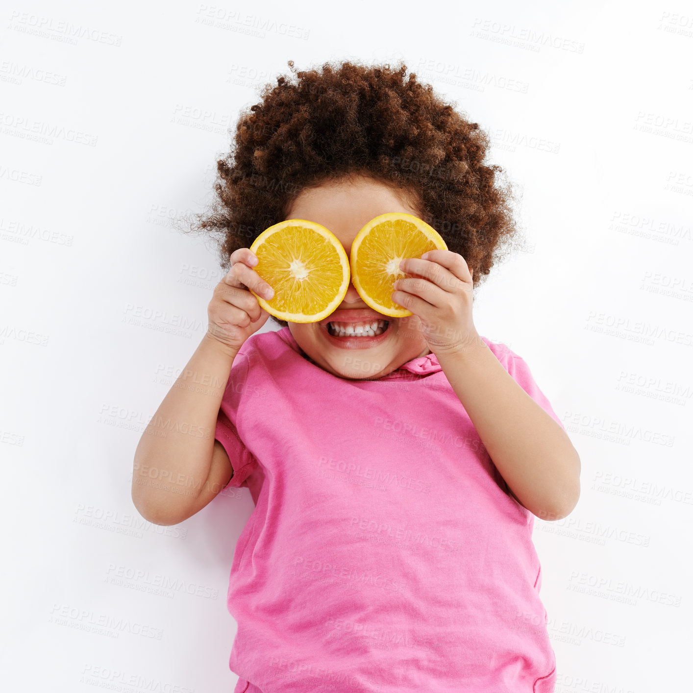 Buy stock photo Happy kid, lemon or vitamin C with fruit for nutrition, detox or sour face on a white studio background. Young, child or female person with smile or tongue out for citrus taste, diet or natural snack