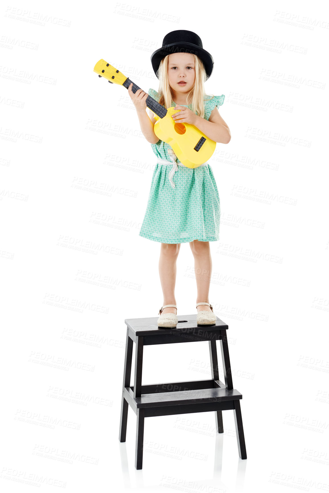 Buy stock photo Fashion, guitar and portrait of child in studio on step for playing music, practice and learning songs. Childhood, creative and isolated young girl with musical instrument toy on white background