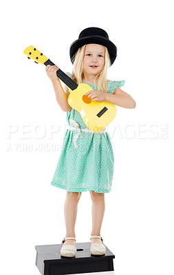 Buy stock photo Talent show, guitar and child in studio on step for playing music, practice and learning songs. Kid, creative and isolated young girl with musical instrument for performance on white background