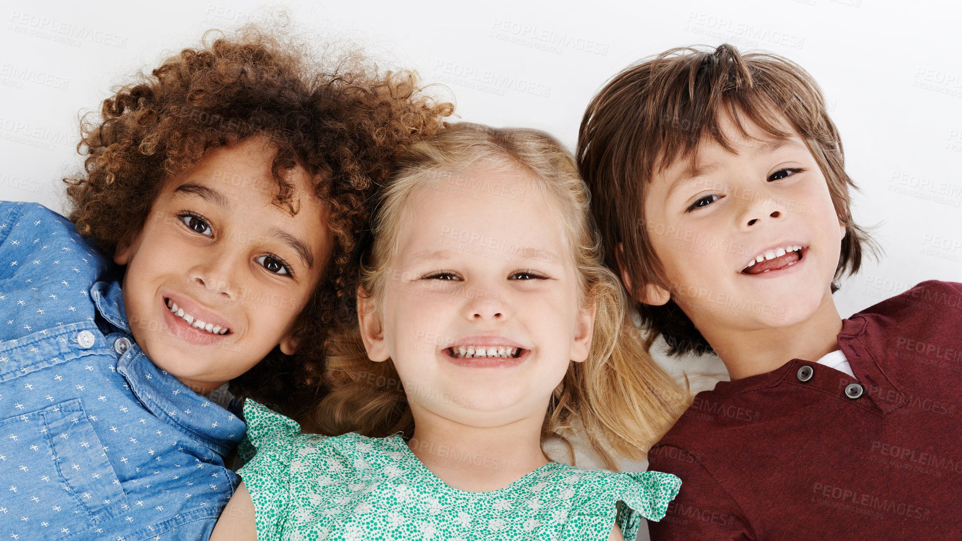 Buy stock photo Studio, above and portrait of children with smile for development, connection or bonding together. Happy, friends and face of little kids with joy for cheerful, innocent or growth by white background