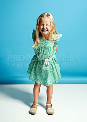 Buy stock photo Shot of an adorable little girl smiling at the camera
