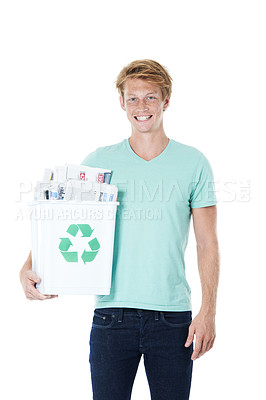 Buy stock photo Man, volunteer and recycling bin for garbage, climate change and littering with clean sustainability. Green activism, newspaper and white studio background for pollution, ecology and accountability