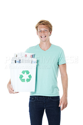 Buy stock photo Man, volunteer and recycling bin for trash, climate change and littering with clean sustainability. Portrait smile, newspaper and white studio background for pollution, ecology and accountability