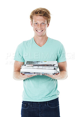 Buy stock photo Happy man, portrait and newspaper with books for recycling, global warming or reproduction on a white studio background. Young, male person or model with smile for community or volunteering post