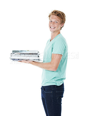 Buy stock photo Happy man, portrait and newspaper with pile for recycling, global warming or reproduction on a white studio background. Young, male person or model with smile or magazine for reuse or volunteering