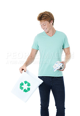 Buy stock photo Happy man, recycling and paper with bin for global warming on a white studio background. Young model, male person or volunteer with reusable material, bucket or trash for eco planet or save the earth