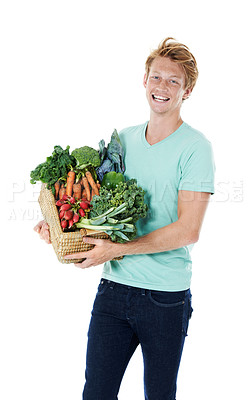 Buy stock photo Man, vegetables and basket in studio portrait with smile, excited and organic produce by white background. Person, shopping and container for grocery, nutrition and vegan diet with discount in Spain