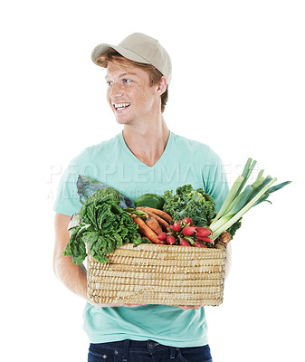 Buy stock photo Delivery man, vegetables and basket in studio with groceries, order and organic produce by white background. Person, container and happy courier with thinking, package or excited for career with food