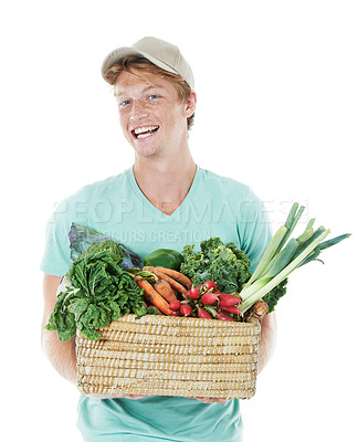 Buy stock photo Man, portrait and happy with vegetables in studio for eco friendly small business and fresh produce on mockup. Sustainability, face or person with basket for healthy food supplier on white background