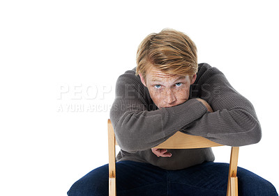 Buy stock photo Portrait, freckles and man on chair, style and confident person isolated on white studio background. Face, model and guy sitting, aesthetic and mockup space with fashion, relaxing and comfortable