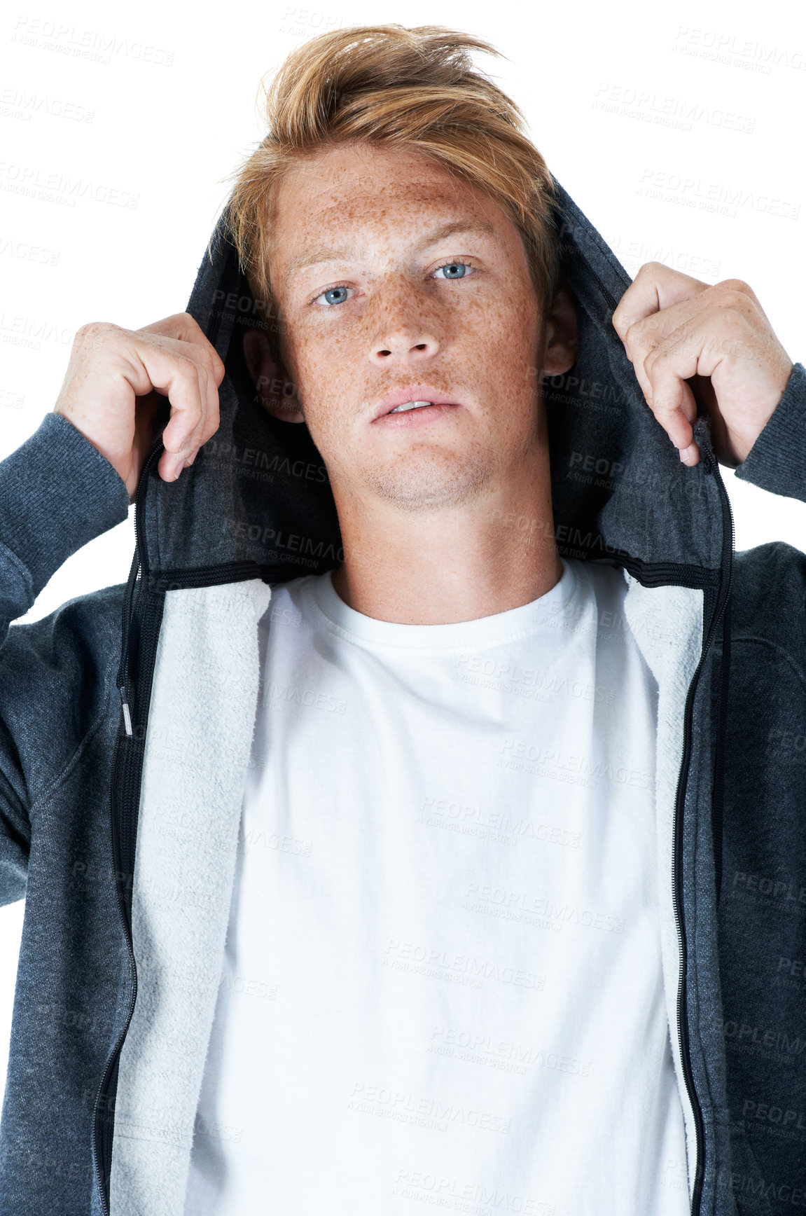 Buy stock photo Cool, portrait and teenager in hoodie at studio with serious face in streetwear on white background. Winter fashion, guy and edgy model with casual style, clothes or comfortable with outfit in Sweden