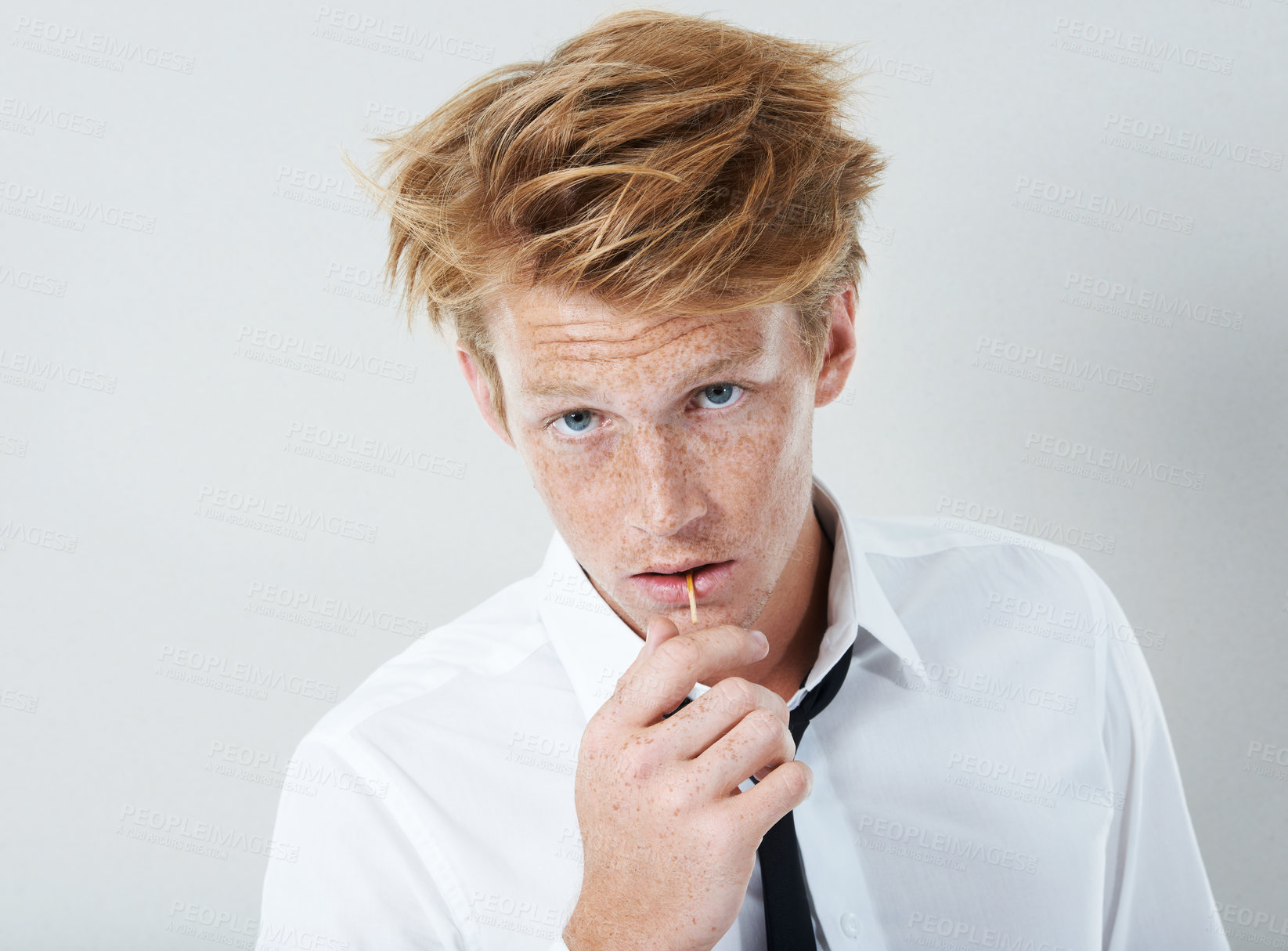 Buy stock photo Fashion, edgy or portrait of man with tie, pride and elegant shirt for event or modern attire with matchstick. Confident, formal clothes or cool model in studio with style on white background in USA