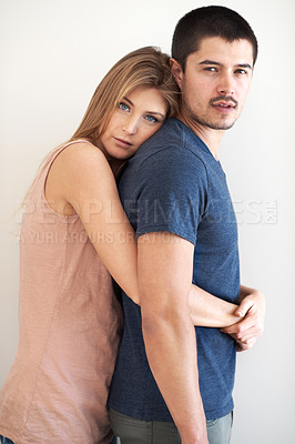 Buy stock photo Serious, portrait or couple hug in house for love with support, partner and soulmate. Embrace, face or people bonding in marriage relationship together for support, loyalty or commitment in Spain