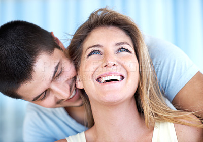 Buy stock photo Cropped head and shoulders shot of a happy and attractive young couple