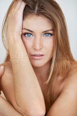 Buy stock photo Cropped head and shoulders portrait of a beautiful young nude woman 