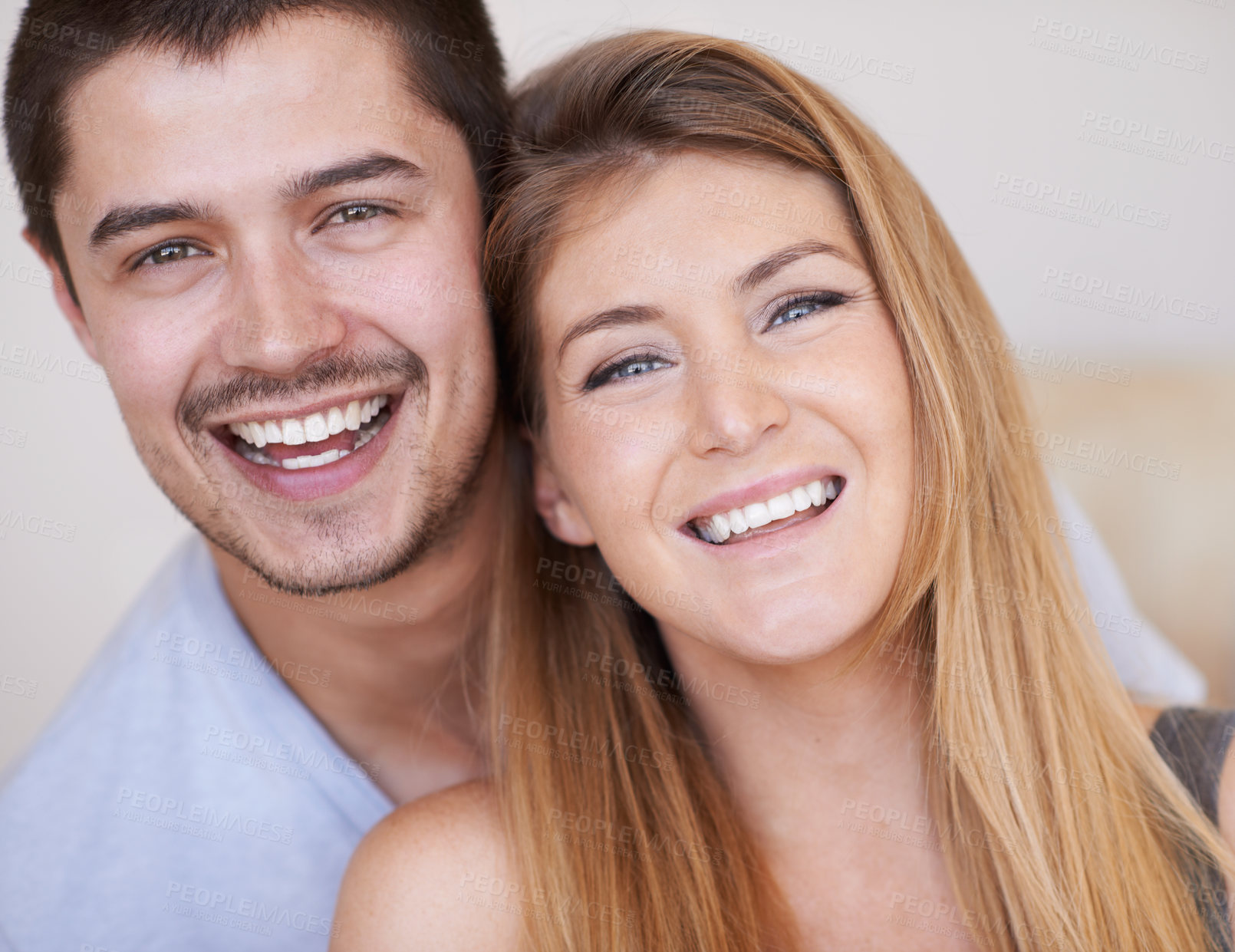 Buy stock photo Laughing, portrait or happy couple hug in house for love with smile, funny joke or soulmate. Joy, face or people bonding in marriage relationship together for support, loyalty or commitment in Spain