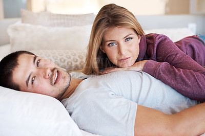 Buy stock photo Love, marriage and portrait of couple on bed to relax, bonding and spending quality time together in home. Relationship, man and woman in bedroom with romance, embrace and care in apartment in USA.