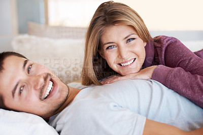 Buy stock photo Love, smile and portrait of couple on bed to relax, bonding and spending quality time together in home. Relationship, happy man and woman in bedroom with romance, embrace and care in apartment in USA