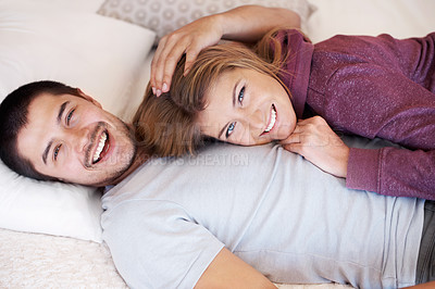 Buy stock photo Love, portrait and happy couple on bed from above to relax, bonding and spending quality time together in home. Relationship, man and woman in bedroom with romance, embrace and smile in apartment.