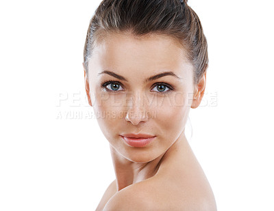 Buy stock photo Portrait of a beautiful young woman with perfect skin against a white background