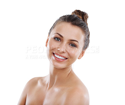 Buy stock photo Portrait of a beautiful young woman with perfect skin smiling against a white background
