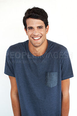 Buy stock photo Portrait, man and fashion in studio with happiness in casual wear, style and outfit on white background. Male person, isolated and smile with comfortable t-shirt, cotton clothing and confidence