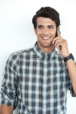 Buy stock photo Creative, phone call or happy man in studio thinking of white background for communication or networking. Feedback, fashion ideas or designer speaking on mobile for listening, discussion or talking