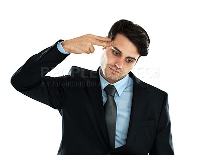 Buy stock photo Stress, businessman and depression with hand gun to the head in studio against white background. Anxiety, suicide and young entrepreneur suffering mental breakdown after business fail and isolated