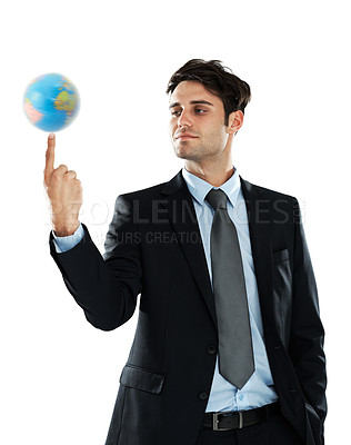 Buy stock photo Global, business and man with earth on finger, sustainability and future in international industry isolated on white background. Balance, work and corporate businessman with planet in hand in studio.
