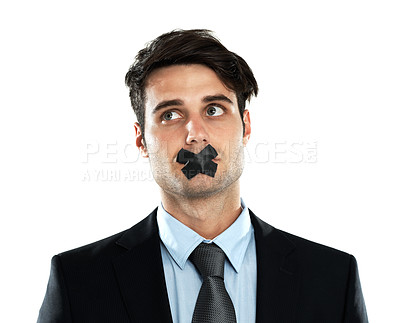 Buy stock photo Business man, tape on lips and corporate silence for secret, privacy and confidential information in studio. Person with mouth covered for censored, scared and hush isolated on a white background